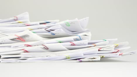 Sort-pile-of-paper-of-report-and-paperwork-time-lapse