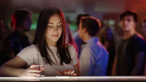 Boy-and-girl-checking-each-other-out-in-bar