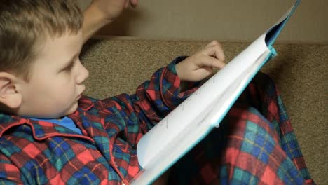 Dad-and-son-read-a-book