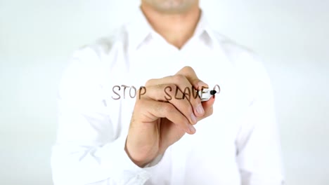 Stop-Slavery,-Man-Writing-on-Glass