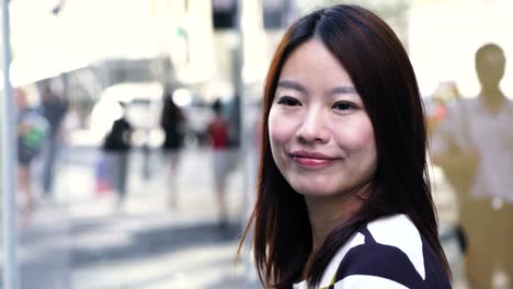 Beautiful-Asian-Women-in-Pretty-Clothes-Standing-in-a-City-Environment.-City-Life-Background.