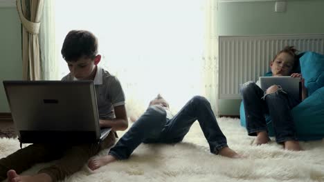 Three-little-brothers-spend-leisure-time-at-home