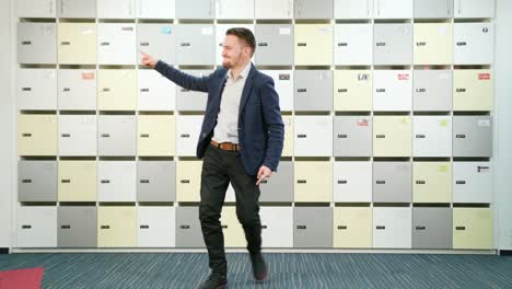 Young-Businessman-Dancing-Indoors