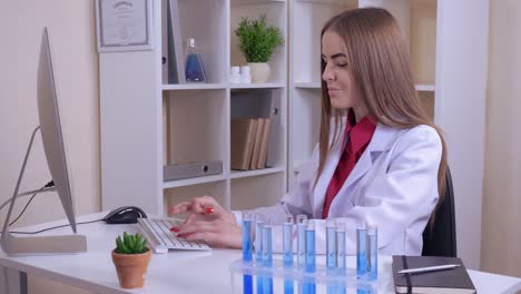 laboratory-workers-work-with-computer