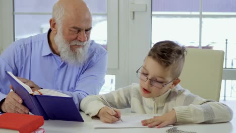 Grandson-asks-grandpa-to-help-him-with-homework