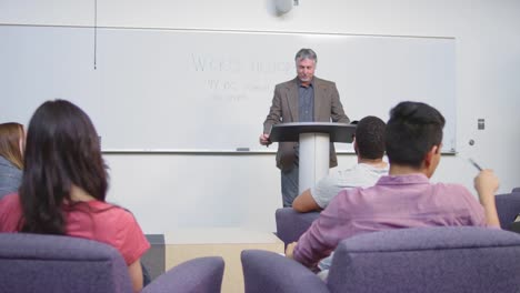 A-student-walks-to-the-front-of-the-class-and-nervously-starts-her-speech