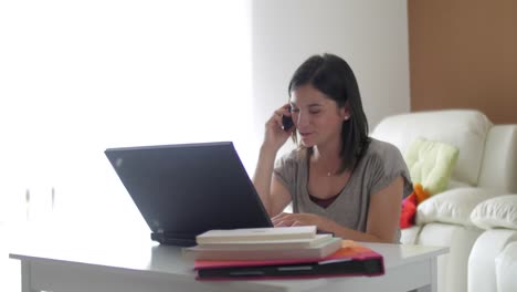 Nice-girl-at-home-by-her-laptop