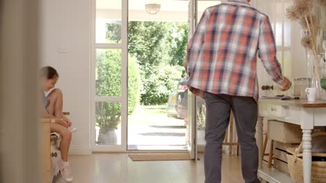 Girl-Leaving-Home-For-School-With-Father