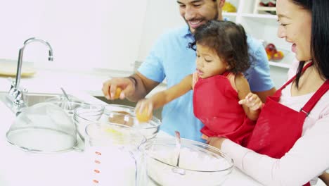 Asian-Chinese-parents-infant-daughter-home-kitchen-baking