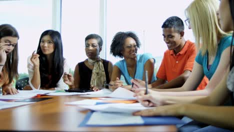 Multi-ethnic-teenagers-with-African-American-female-tutor