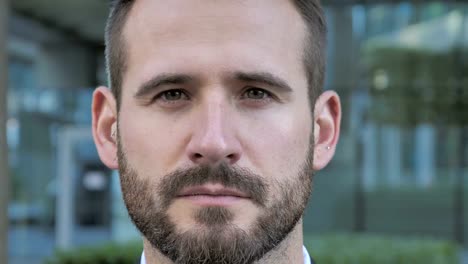 Close-up-of-Serious-Face-of-Beard-Businessman