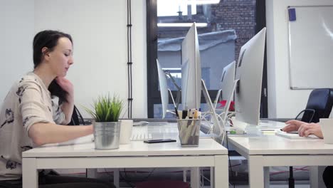 Young-people-working-in-small-office