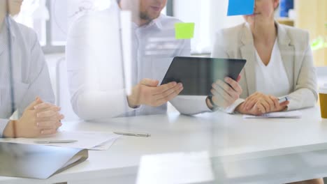 business-team-with-papers-working-at-office