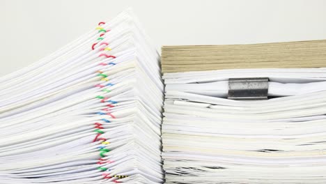 Overload-document-and-envelope-on-paperwork-with-white-background-time-lapse