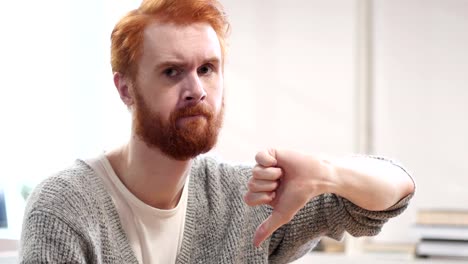 Thumbs-Down-by-Man-with-Red-Hairs