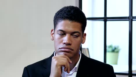 Portrait-of-Thinking-Pensive-Black-Businessman