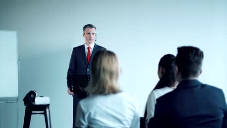 Attentive-young-audience-in-a-business-meeting