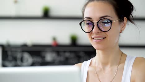 Cute-woman-working-in-trendy-office