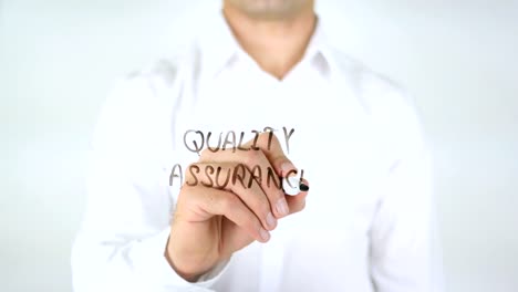 Quality-Assurance,-Man-Writing-on-Glass