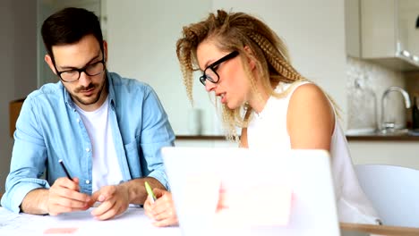 Coworkers-working-at-business-office-and-using-tablet