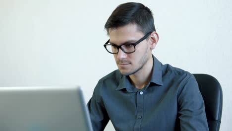 Young-man-working-on-a-computer