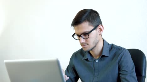 Young-man-talking-on-the-phone