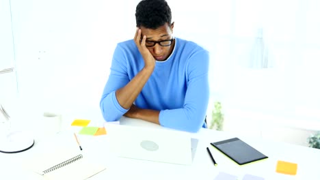 Afro-American-Creative-Designer-Sleeping-in-His-Office