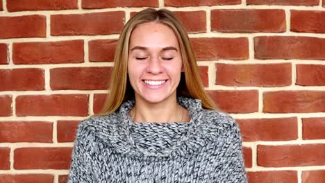 Portrait-of-Smiling-Young-Girl-in-Loft-Office