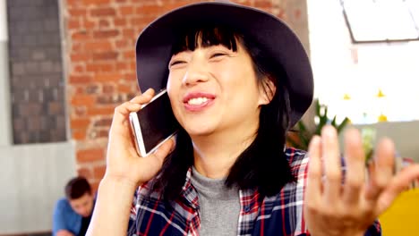 Happy-woman-talking-on-mobile-phone-4k