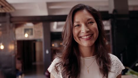 Smiling-woman-in-office-lobby