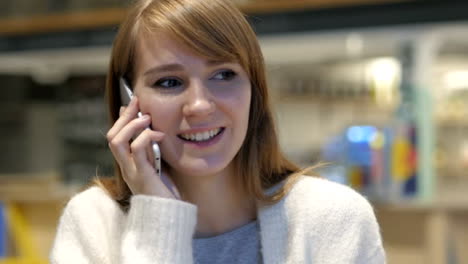 Young-Woman-Talking-on-Phone,-Attending-Phone-Call