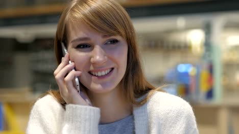 Young-Woman-Talking-on-Phone,-Attending-Phone-Call