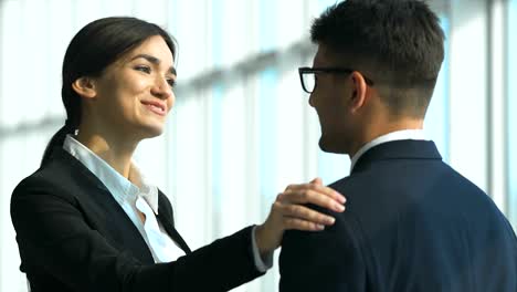 The-happy-business-couple-talking.-slow-motion