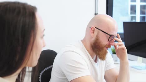 Office-workers-talking-and-laughing