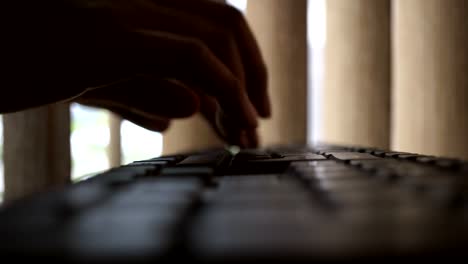 Closeup-man-hands-typing-keyboard