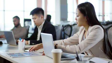 Hardworking-Employees-Using-Computers-in-Office