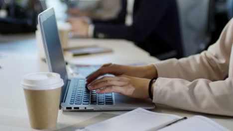 Asian-Woman-Planning-Work-in-Office