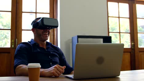 Businessman-using-virtual-reality-headset-in-office-4k