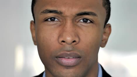 Close-Up-of-Shocked-Face-of-Casual-Afro-American-Businessman,-Astonished-by-Loss