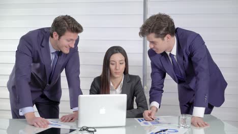 Business-people-discussing-a-project-in-an-office