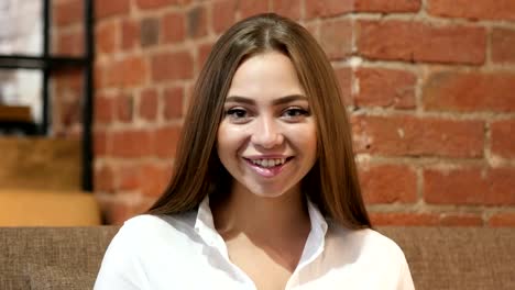 Portrait-of-Smiling-Young-Girl