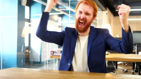 Excited-Man-Celebrating-Success,-Red-Hairs