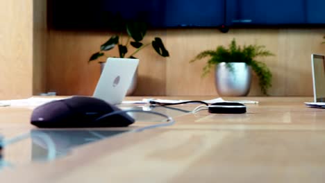 Team-of-business-executives-applauding-in-conference-room