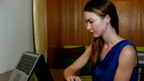 Frustrated-and-depressed-young-entrepreneur-business-woman-working-on-laptop