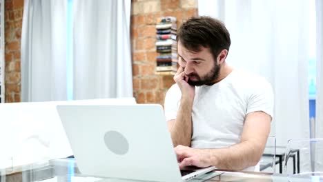 Tension-and-Headache,-Frustrated-Beard-Man-Working-on-Laptop