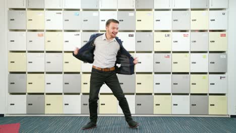 Young-Businessman-Dancing-Indoors