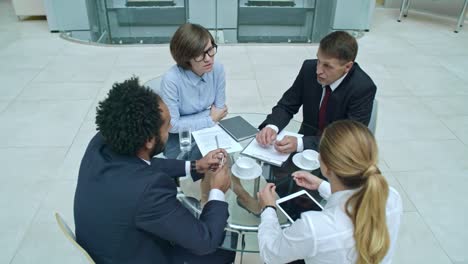 Employees-Speaking-at-Meeting