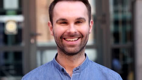 Smiling-Casual-Man-Looking-at-Camera