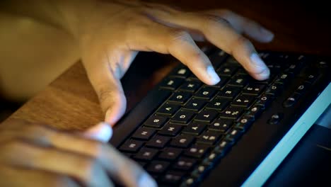 Close-up,-Hands-of-an-Indian-Guy-Dial-Text-On-The-Computer-Keyboard