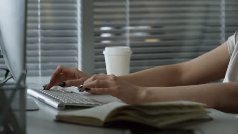 Female-Editor-Working-on-Desktop-Computer